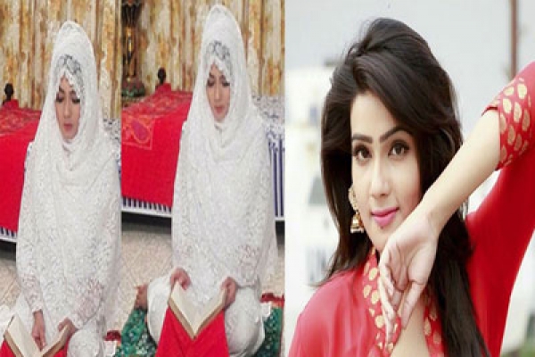 ওজু করে, পাকপবিত্র হয়ে কুরআন শরীফ পড়ছেন নায়িকা মাহি!