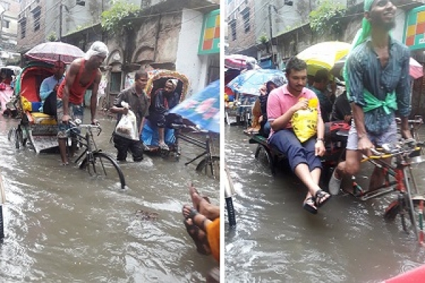 ঝুম বৃষ্টিতে নাকাল রাজধানীবাসী