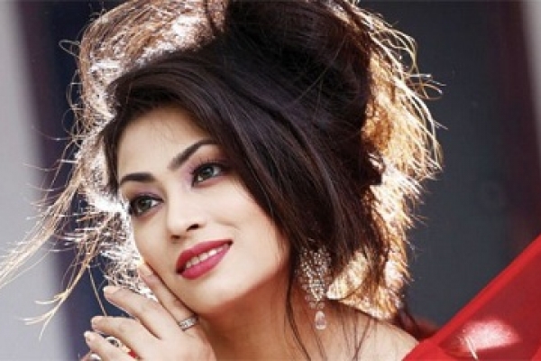 বিশ বছরের পপি!