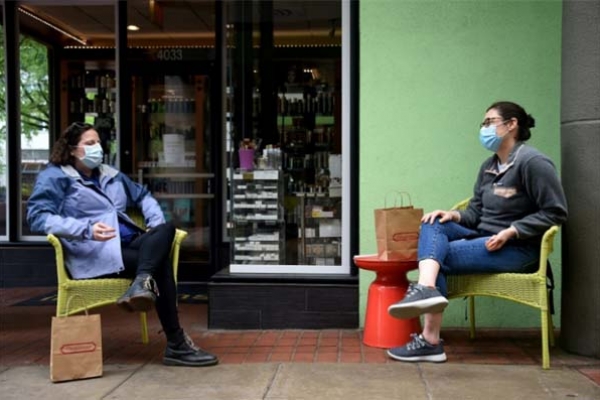 কথা বলার সময়ও ছড়াতে পারে করোনা: বলছে গবেষণা