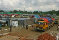 শিমুলিয়াঘাটে গাড়ি চালকদের জিম্মি করে চাঁদাবাজি