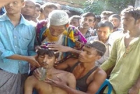 মৃত ব্যক্তিকে জীবিত করতে ওঝার কেরামতি