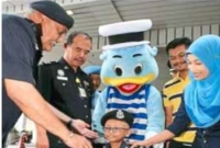 বয়স ৯ কিন্তু পুলিশ অফিসার!