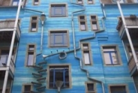 বৃষ্টি এলেই গান গেয়ে ওঠে যে বাড়িটি