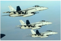 বিমান থেকে অস্ত্র ফেলছে যুক্তরাষ্ট্র