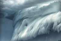 বিশ্ব আতঙ্কে সিডনির আকাশে 'সুনামি মেঘ' রহ্স্য কী?