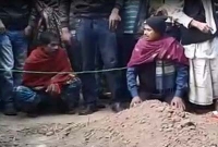 কবরে জীবন্ত যুবক!