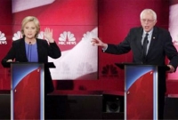 হিলারি-স্যান্ডার্সের তুমুল বাক্যুদ্ধ হিলারি-স্যান্ডার্সের তুমুল বাক্যুদ্ধ