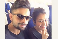 কোহলির সাথে বিমানে কে এই যুবতী!