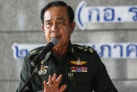 মহিলারা স্বল্প পোশাক পরলে বাজারের খোলা চকলেটের মত মনে হয় : থাই প্রধানমন্ত্রী