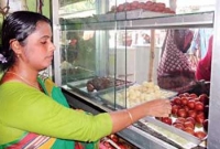 স্বামীর মৃত্যুর পর  স্ত্রী মিষ্টির দোকানে