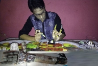 অনুভূতি সম্পন্ন কৃত্রিম হাত তৈরি করেছে চট্টগ্রামের রায়হান