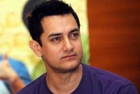 ‘‌বাবা’‌ হবেন না আমির