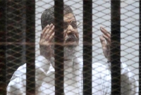 যে কারণে মুরসিকে ২০ বছরের কারাদণ্ড দিয়েছে আদালত