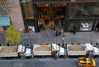 ট্রাম্প টাওয়ারের সামনে বালুর ট্রাক মোতায়েন ট্রাম্প টাওয়ারের সামনে বালুর ট্রাক মোতায়েন