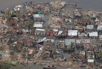 ভয়ংকর ঝড় ও ভূমিকম্পের জোড়া ধাক্কায় বিপর্যস্ত আমেরিকা