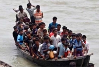 নাফ নদীতে রোহিঙ্গাবোঝাই ৯টি নৌকা মিয়ানমারে ফেরত নাফ নদীতে রোহিঙ্গাবোঝাই ৯টি নৌকা মিয়ানমারে ফেরত