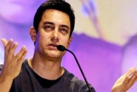 নিষেধাজ্ঞা ভেঙে আমিরই প্রথম যাচ্ছেন পাকিস্তানে