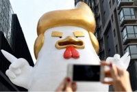 মার্কিন হবু প্রেসিডেন্ট ট্রাম্প এখন চীনা মোরগ!