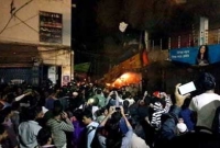 আগুনে ধসে পড়েছে ডিসিসি মার্কেটের একাংশ আগুনে ধসে পড়েছে ডিসিসি মার্কেটের একাংশ