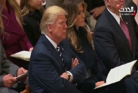 গভীর মনোযোগের সাথে মুগ্ধ হয়ে পবিত্র কোরআনের অর্থ বুঝতে চেষ্টা করেন ডোনাল্ড ট্রাম্প