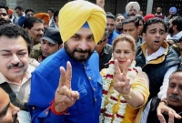 ক্রিকেট মাঠে আর নয়, এবার মন্ত্রীপদে শপথ নিলেন সিধু