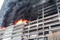 দুবাইয়ের বুর্জ খলিফা টাওয়ারের পাশের বহুতল ভবনে ভয়াবহ আগুন
