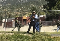  স্কুলে বন্দুকধারীর হামলা, নিহত দুই