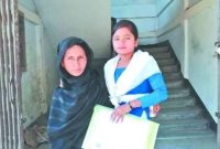 সোনারগাঁওয়ে মায়ের কোলে চড়ে পরীক্ষা দিয়ে সফল প্রতিবন্ধী রিনা
