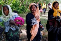 খোলা আকাশের নিচে এক রোহিঙ্গা শিশুর ঘুম