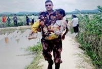 বিজিবি মেজর আশিকুরের যে ছবি ভাইরাল, বিশ্ব গণমাধ্যমে প্রশংসা