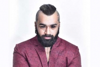 চোখে ট্যাটু করে ওয়েব দুনিয়ায় ভাইরাল আর্টিস্ট করণ কিং