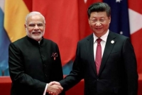 ভারতের সাথে কাঁধে কাঁধ মিলিয়ে চলার শপথ চীনের