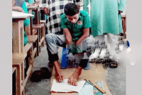 পা দিয়ে লিখেই সমাপনী পরীক্ষা দিচ্ছে মেধাবী ছাত্র আসিফ