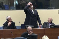 রায় শুনে আদালতে দাঁড়িয়ে বিষ খেলেন যুদ্ধাপরাধী