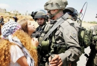 ইসরায়েলি সেনার গালে থাপ্পড় মেরে বীরের মর্যাদায় ভূষিত ফিলিস্তিনি কিশোরী 