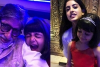 নিজের চুলের ব্যান্ড দিয়ে দাদাকে সাজিয়ে নববর্ষ পালন আরাধ্যর!