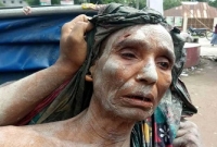 মাকে বিবস্ত্র করে পিটিয়ে হত্যাচেষ্টা ছেলে ও পুত্রবধূর !