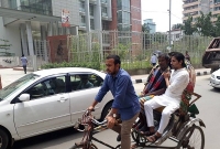 রিকশাচালক অসুস্থ! তাই এক বন্ধু চালকের আসনে আরেক বন্ধু ...