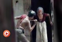 বৃদ্ধা মাকে এ ভাবে লাঠি দিয়ে পেটায়! কখনও টাকার জন্য, কখনও বা... 