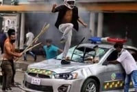 অবশেষে পুলিশের গাড়িতে আগুন দেয়া সেই যুবক শনাক্ত