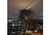 কালো ধোঁয়ায় ছেয়ে গেছে আইফেল টাওয়ার