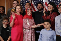 কুরআন মজিদে হাত রেখে শপথ নিলেন মার্কিন মুসলিম এমপিরা