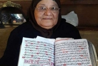 নিজের হাতে সম্পূর্ণ কোরআন শরিফ লিখলেন ৭৫ বছরের নারী