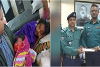 ফুটপাতে প্রসব করা পাগলীর সন্তানকে পরম স্নেহে কোলে তুলে নিলেন এস আই