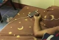 মোবাইল চার্জে রেখে ইয়ার ফোনে গান শুনতে গিয়ে যুবকের মৃত্যু