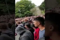 নিউজিল্যান্ডের বিশ্ববিদ্যালয়ের শিক্ষার্থীরা নীরবে দাঁড়িয়ে আজান শুনলেন