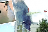 হেলিকপ্টার থেকে জেট পাম্পের মাধ্যমে আগুন নেভানো হয় উন্নত দেশগুলোতে