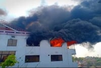 নওগাঁয় বহুতল ভবনে ভয়াবহ আগুন