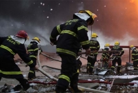 আগুন নেভাতে গিয়ে মৃত্যু হলো ৩০ দমকলকর্মীর